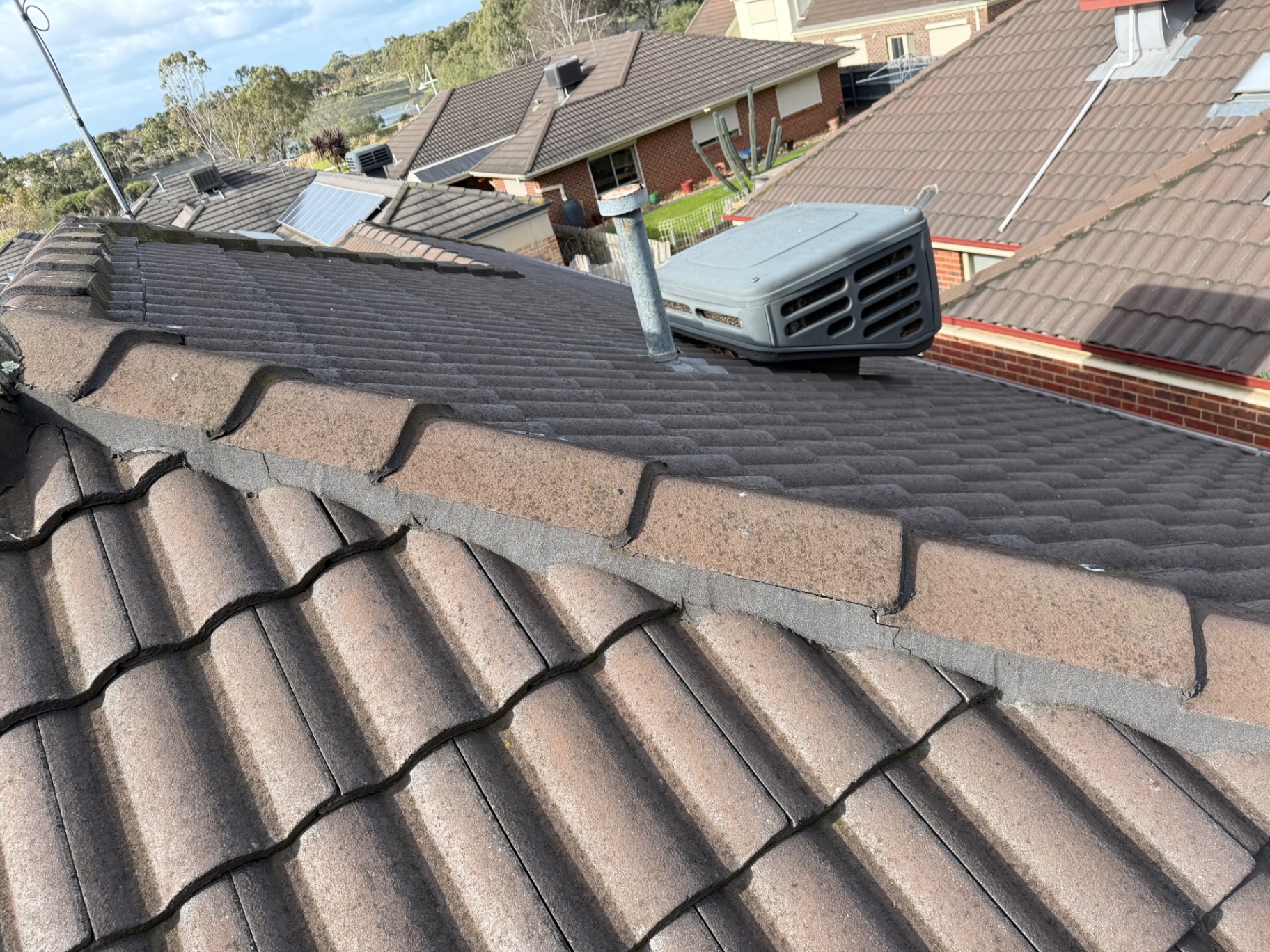 Ridge capping repair on a Melbourne tile roof