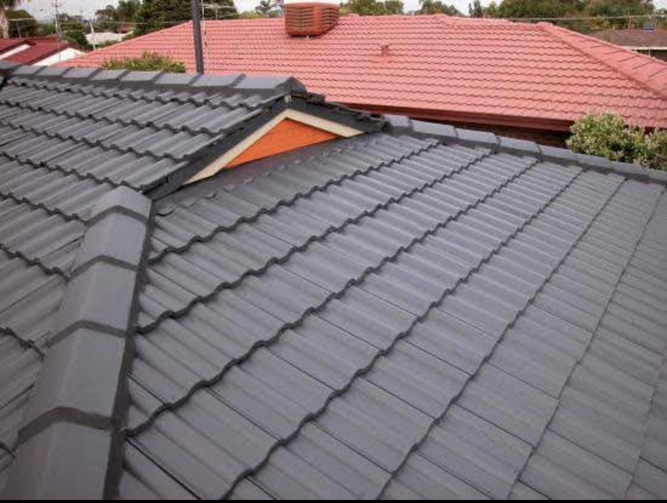 Charcoal tile roof after full restoration